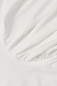 Robe longue dos nu à poignets évasés