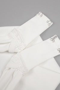 Robe longue dos nu fendue à la queue-de-pie