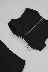 Minitop y falda de cady bordados en negro