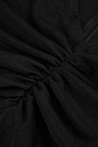 Vestido de punto con aberturas y fruncido en negro