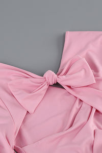 Vestido largo con aberturas anudadas en rosa