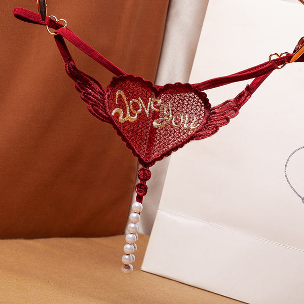 Tanga con bordado de mariposa y perlas para dama