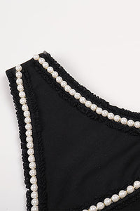Robe longue noire à bordure en dentelle et perles découpées