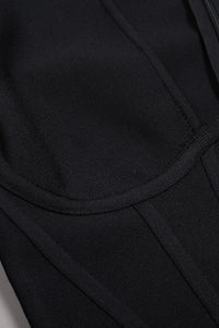 Mini-robe bandage noire à manches longues et détail corset