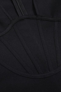 Minivestido ajustado de manga larga con detalle de corsé negro