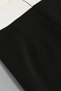Robe midi drapée noire et blanche à découpes et licou