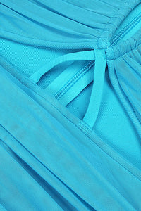 Robe bleue en maille creuse croisée licou