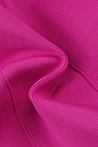 Mini robe bandage ornée d'un nœud découpé en rose