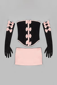 Haut corset, mini-jupe et gants transparents doublés d'un nœud Rocks