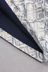 Robe jacquard ajourée argentée à col diagonal et une épaule